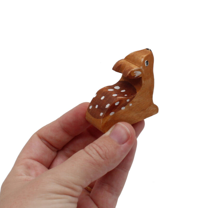 Deer Fawn Wooden Figure in Hand