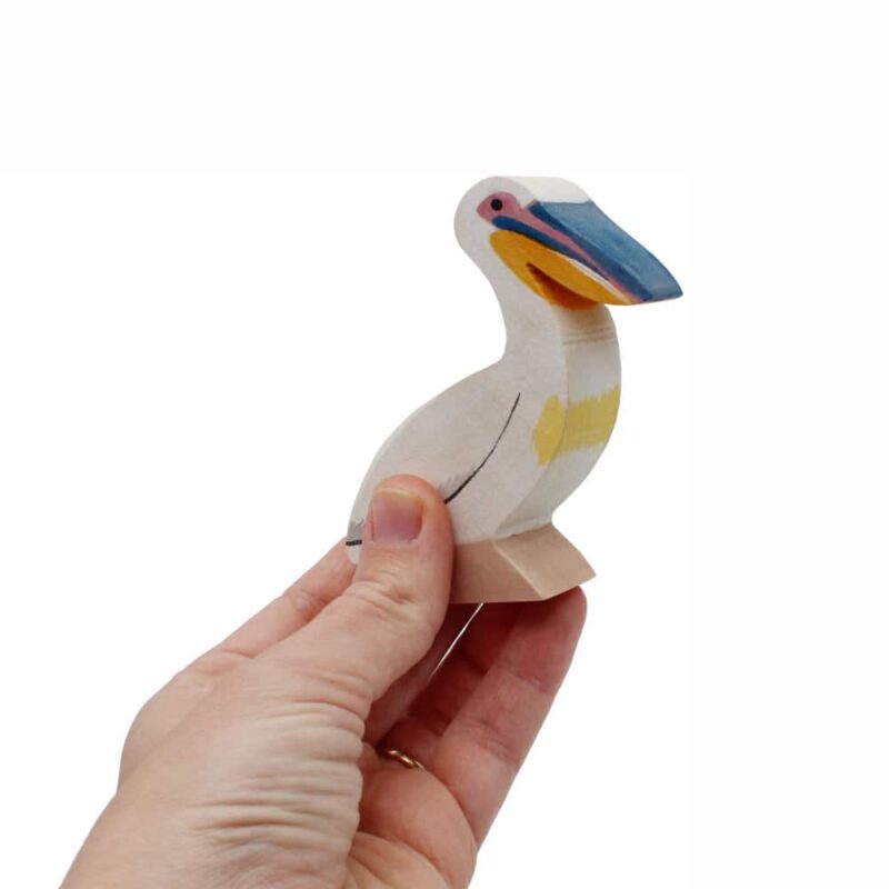 Great White Pelican Wooden Bird In Hand