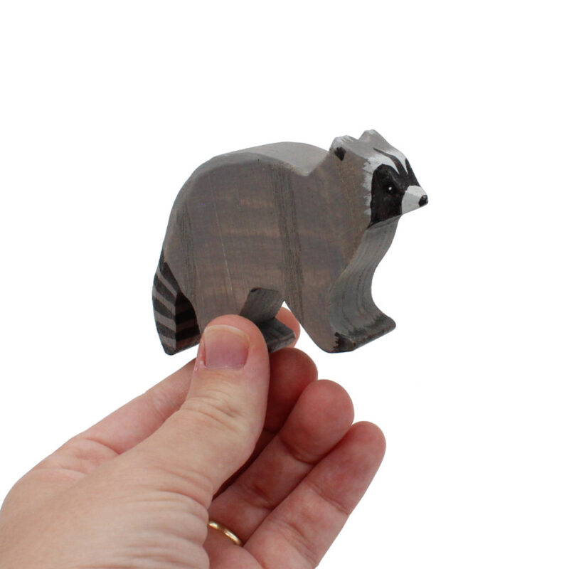 Raccoon Wooden Figure in Hand